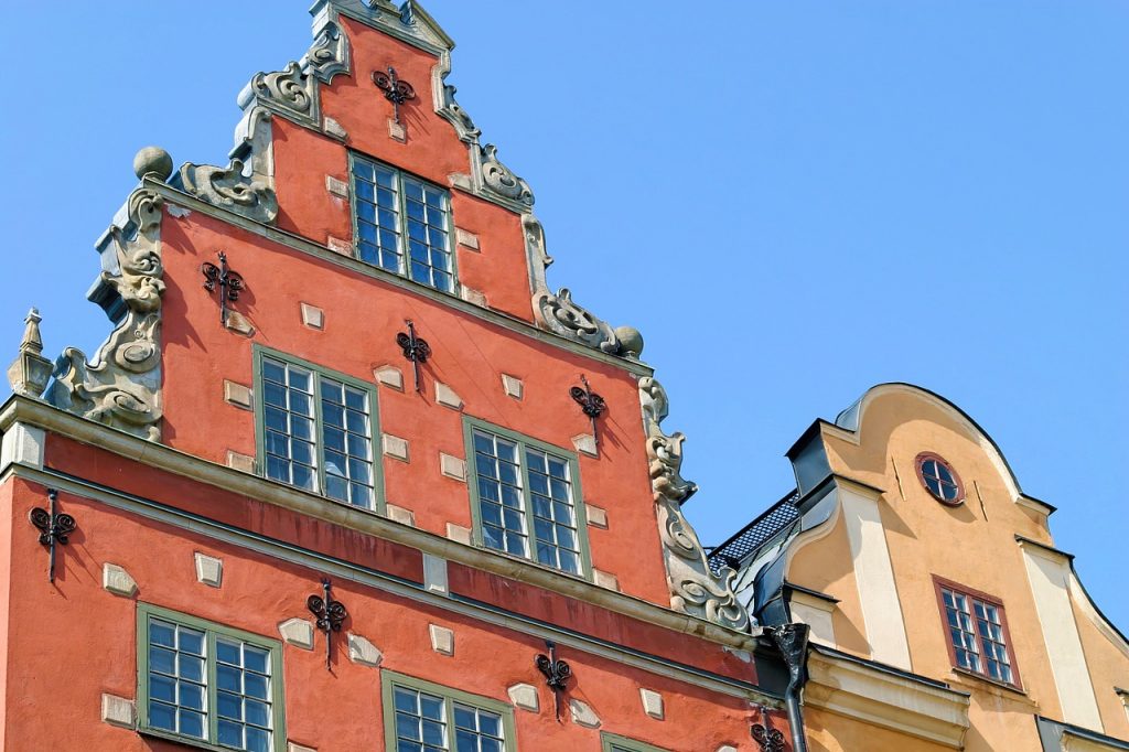 The sun strikes the facades of Gamla Stan